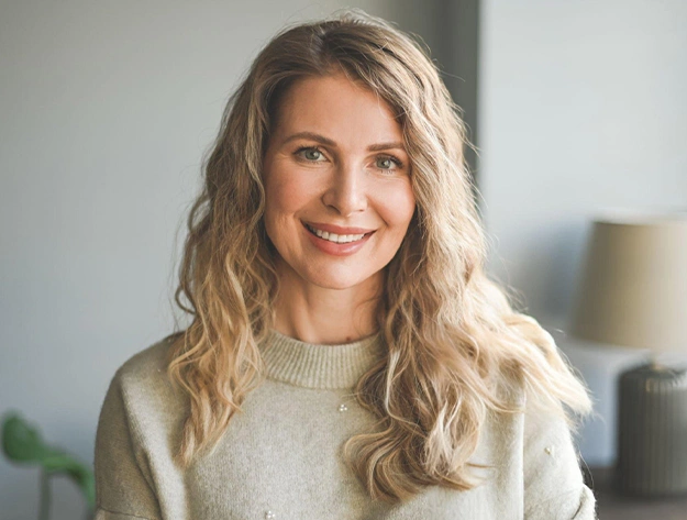 patient smiling after teeth whitening treatment in Frisco, TX