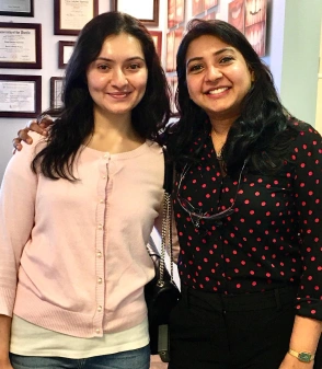 happy patient with frisco dentist after invisalign treatment