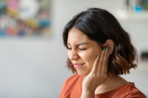 is ear pain normal after tooth extraction